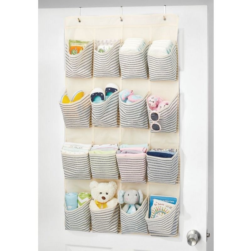 Organizer filled with baby clothes