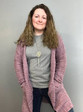 reviewer wearing the pink long cardigan