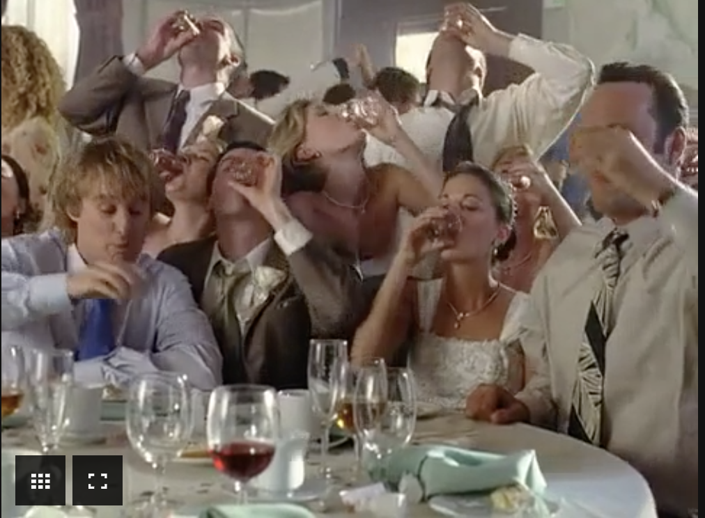 a scene from the movie &quot;wedding crashers&quot; where they are all taking a shot