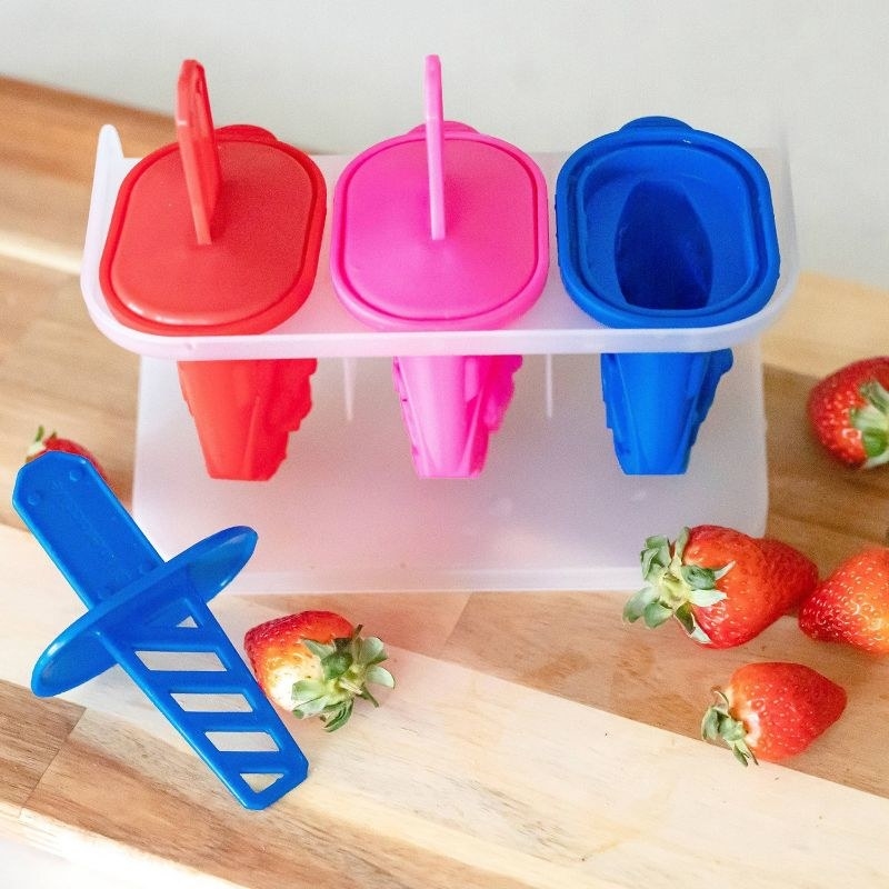 Popsicle set on wooden counter top