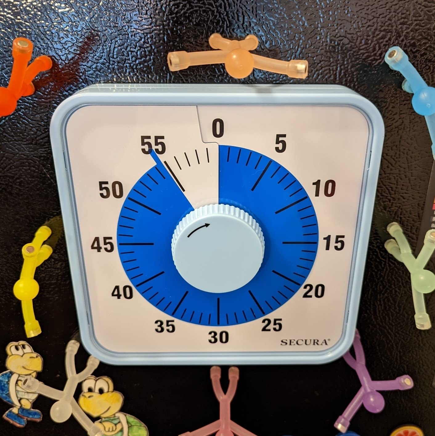 a reviewer photo of the visual timer on a refrigerator