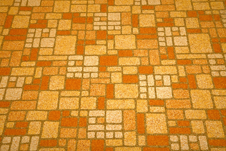 Detailed image of a linoleum tile background from the 1970s