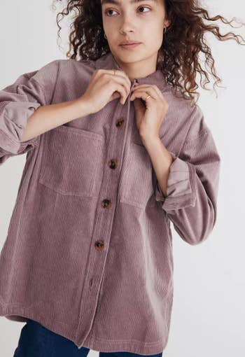 a model in a pink corduroy shacket