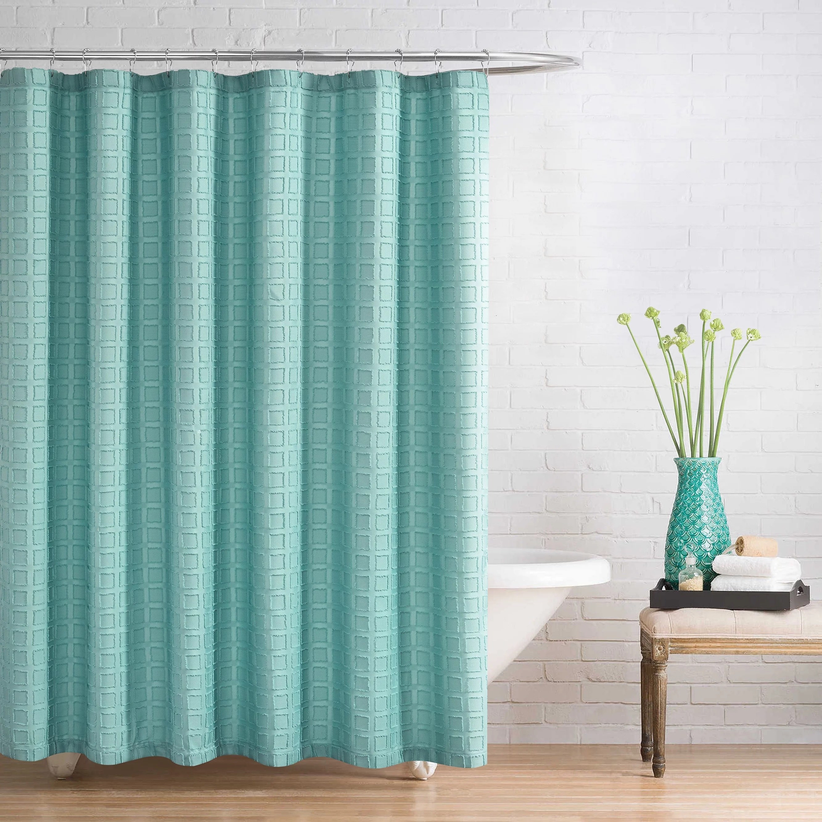 A blue shower curtain