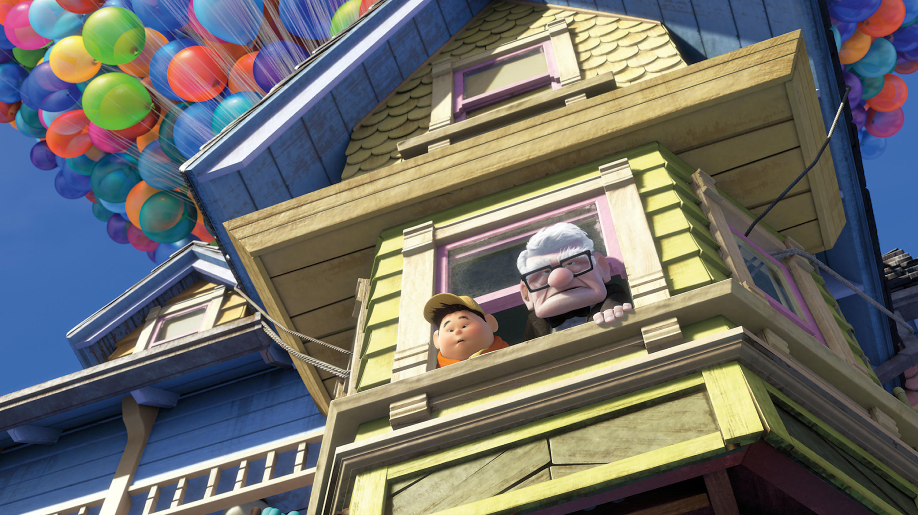 An animated older man and a young boy looking out of a house window with balloons above them