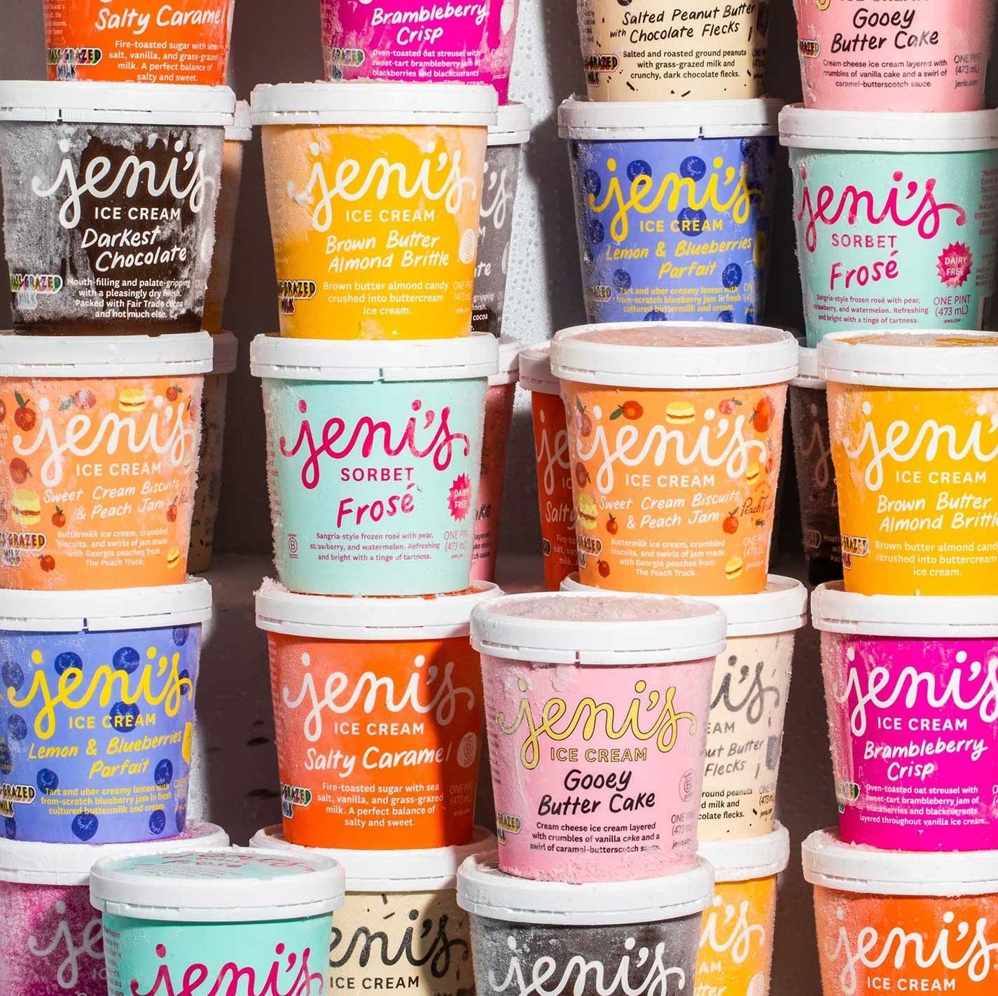 an assortment of colorful frozen pints of ice cream