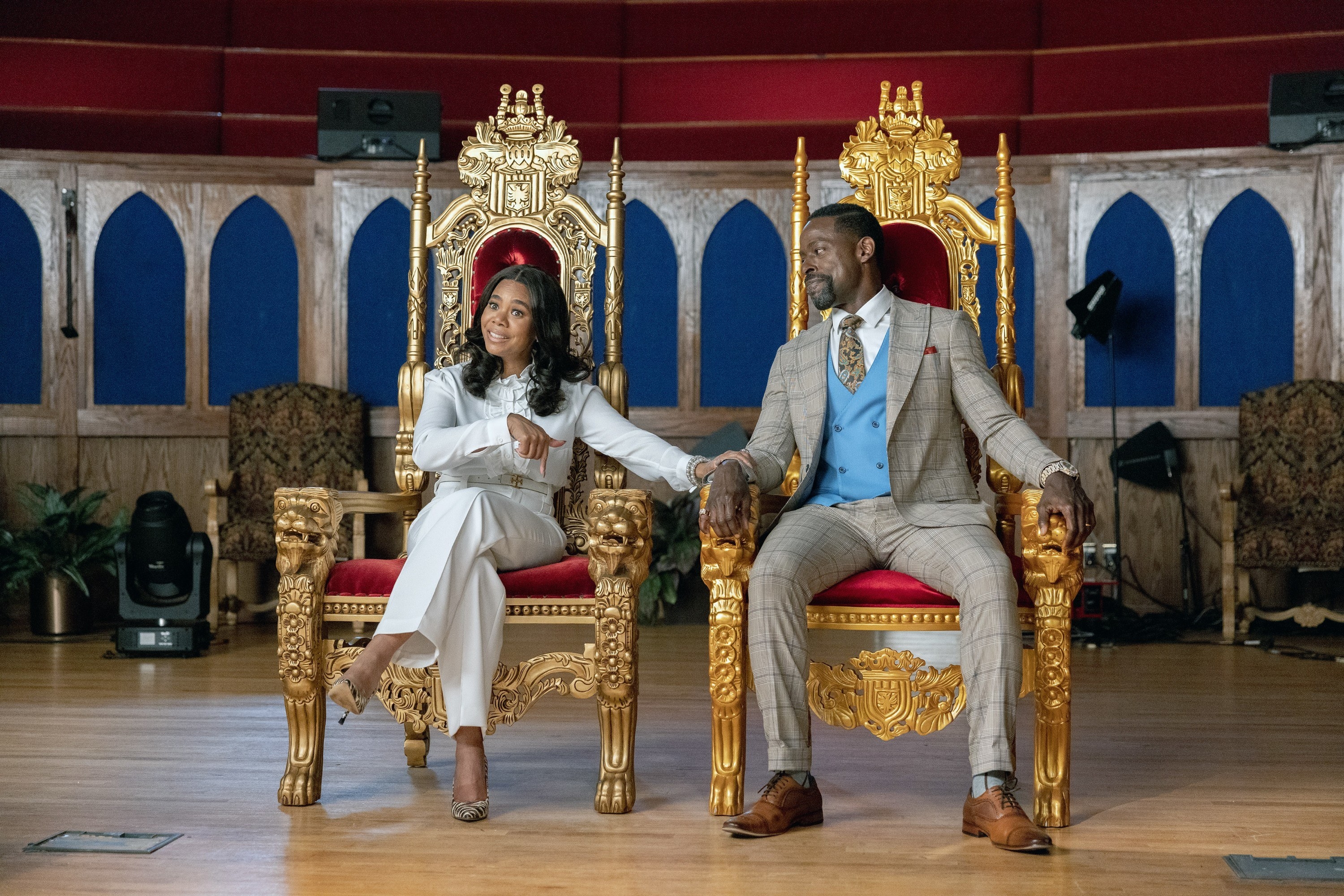 Regina Hall and Sterling K. Brown sit in thrones
