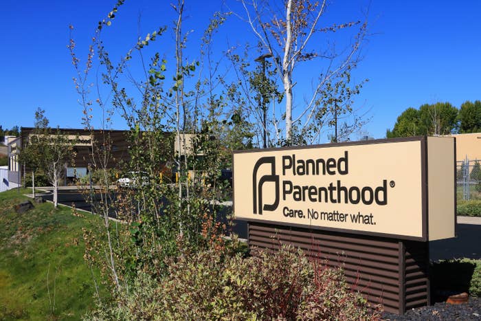 Planned Parenthood clinic entrance with entry sign and building