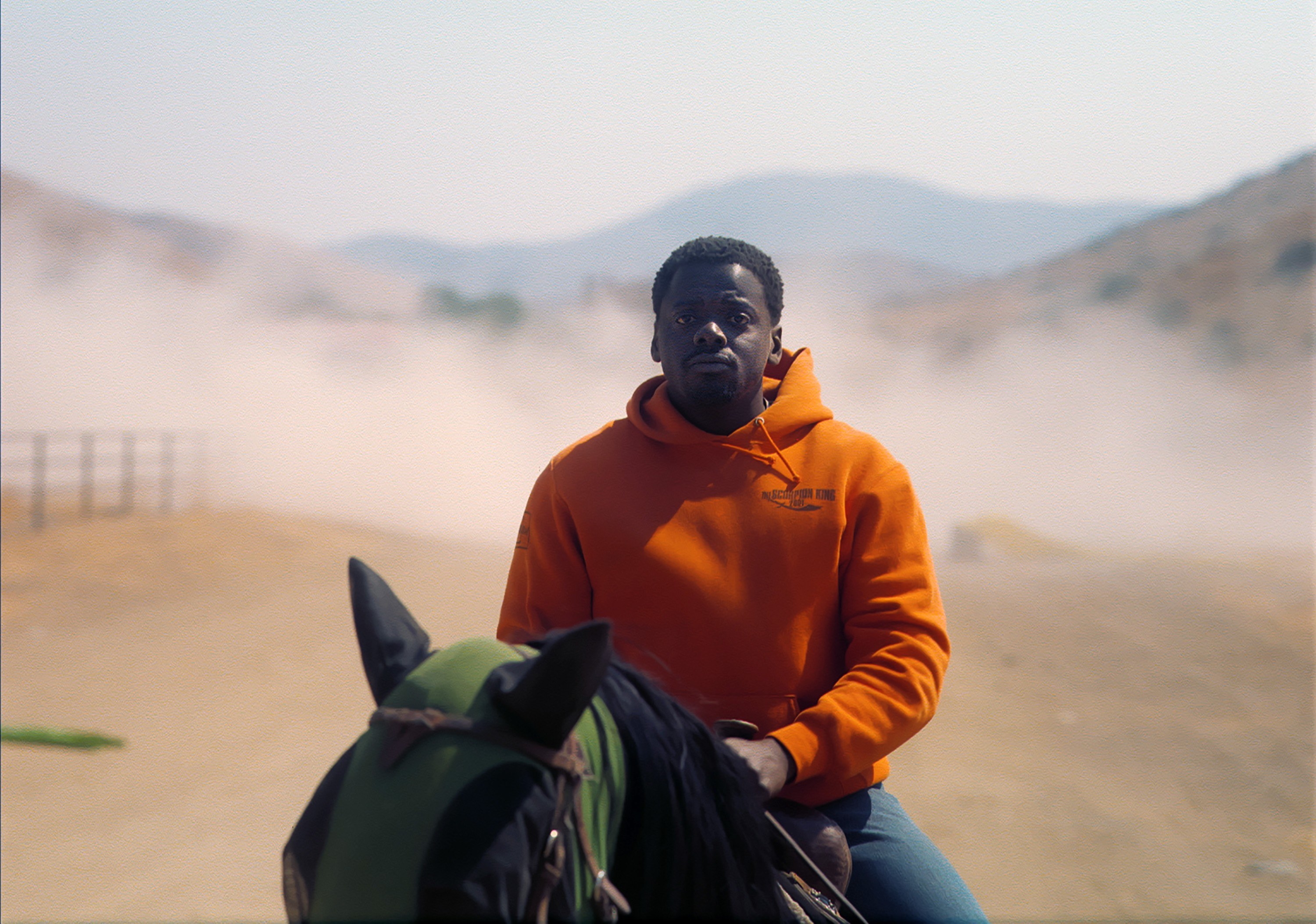 Daniel Kaluuya rides a horse