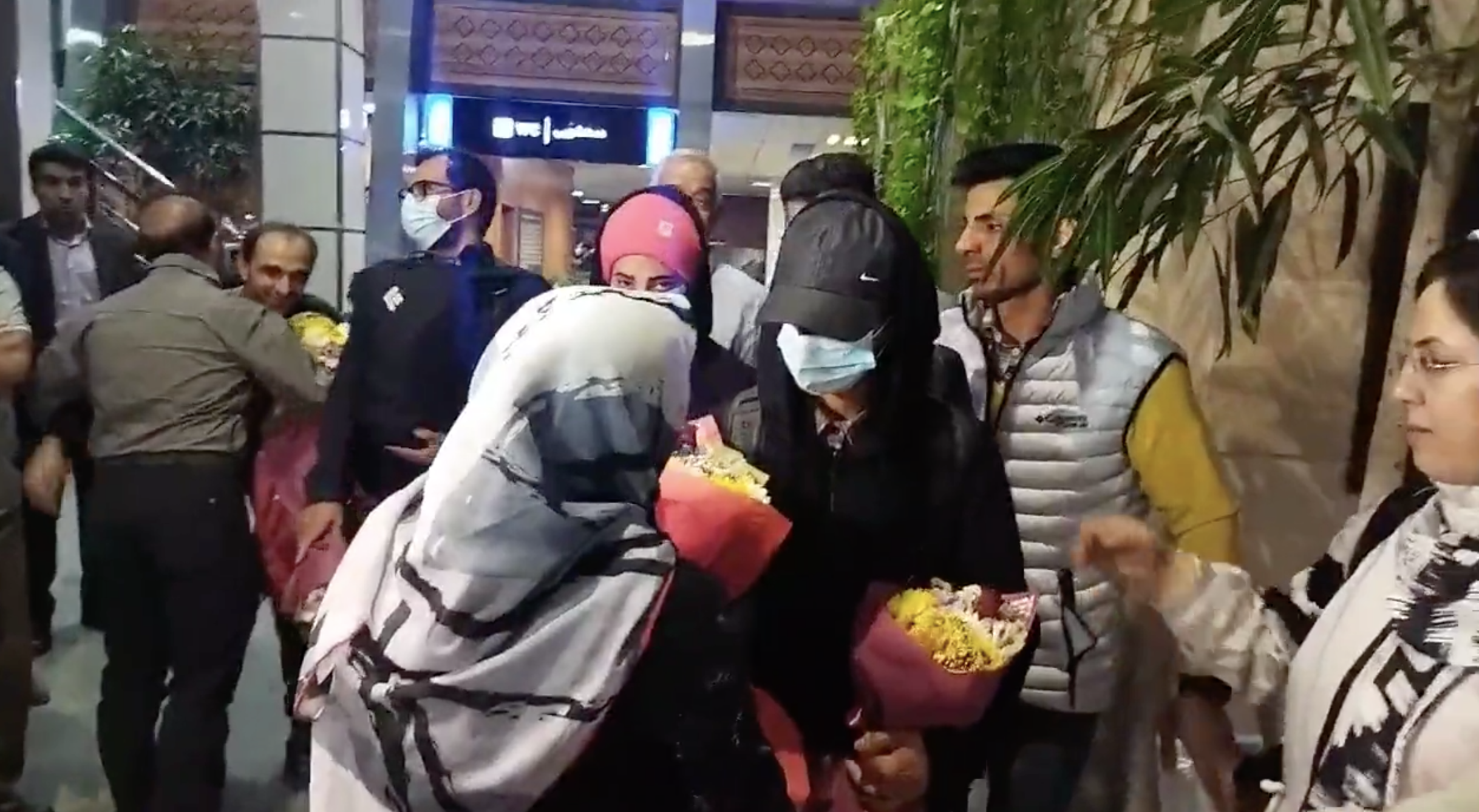 Elnaz Rekabi receives flowers upon her return