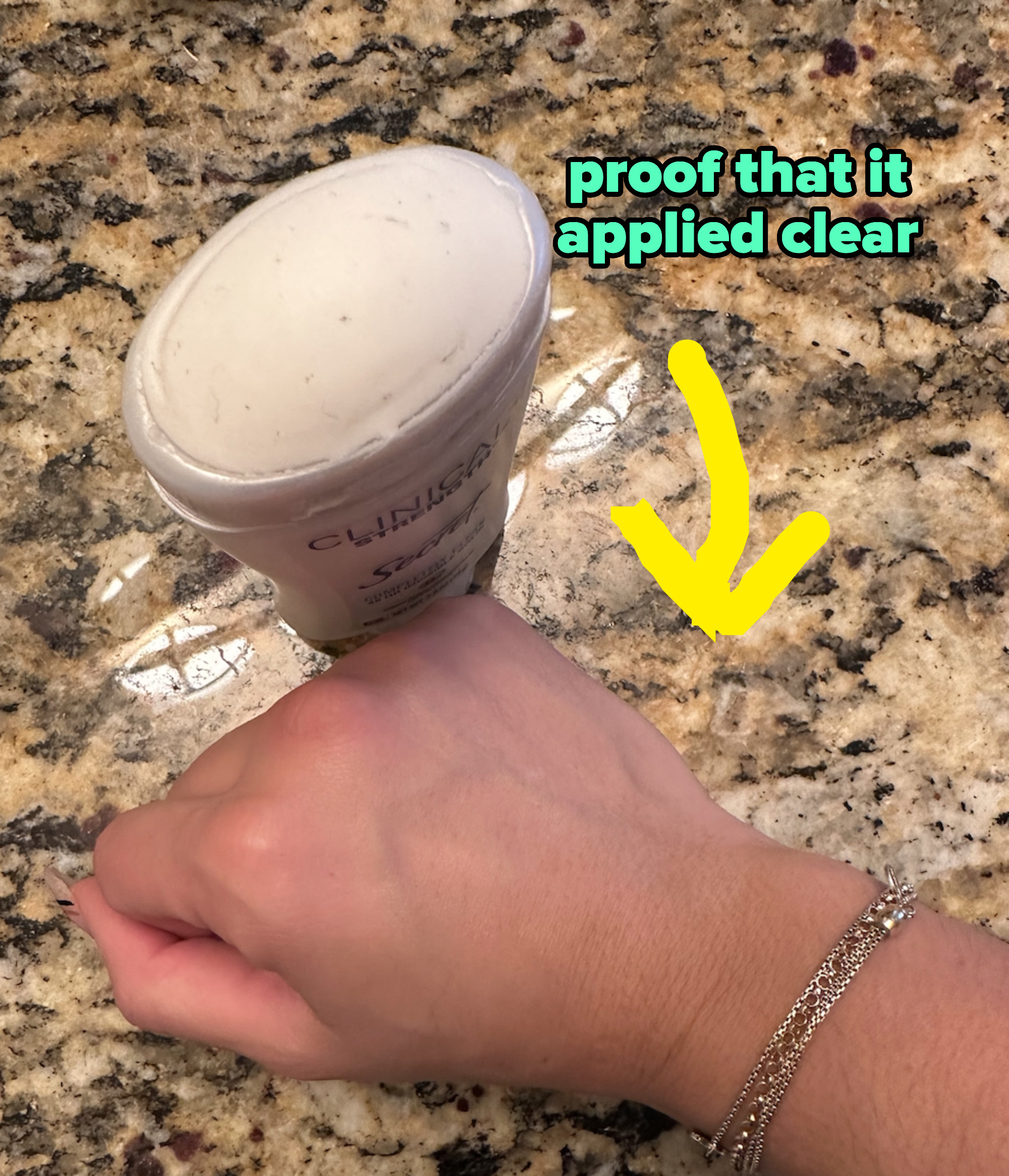 the author showing a lack of deodorant residue after application
