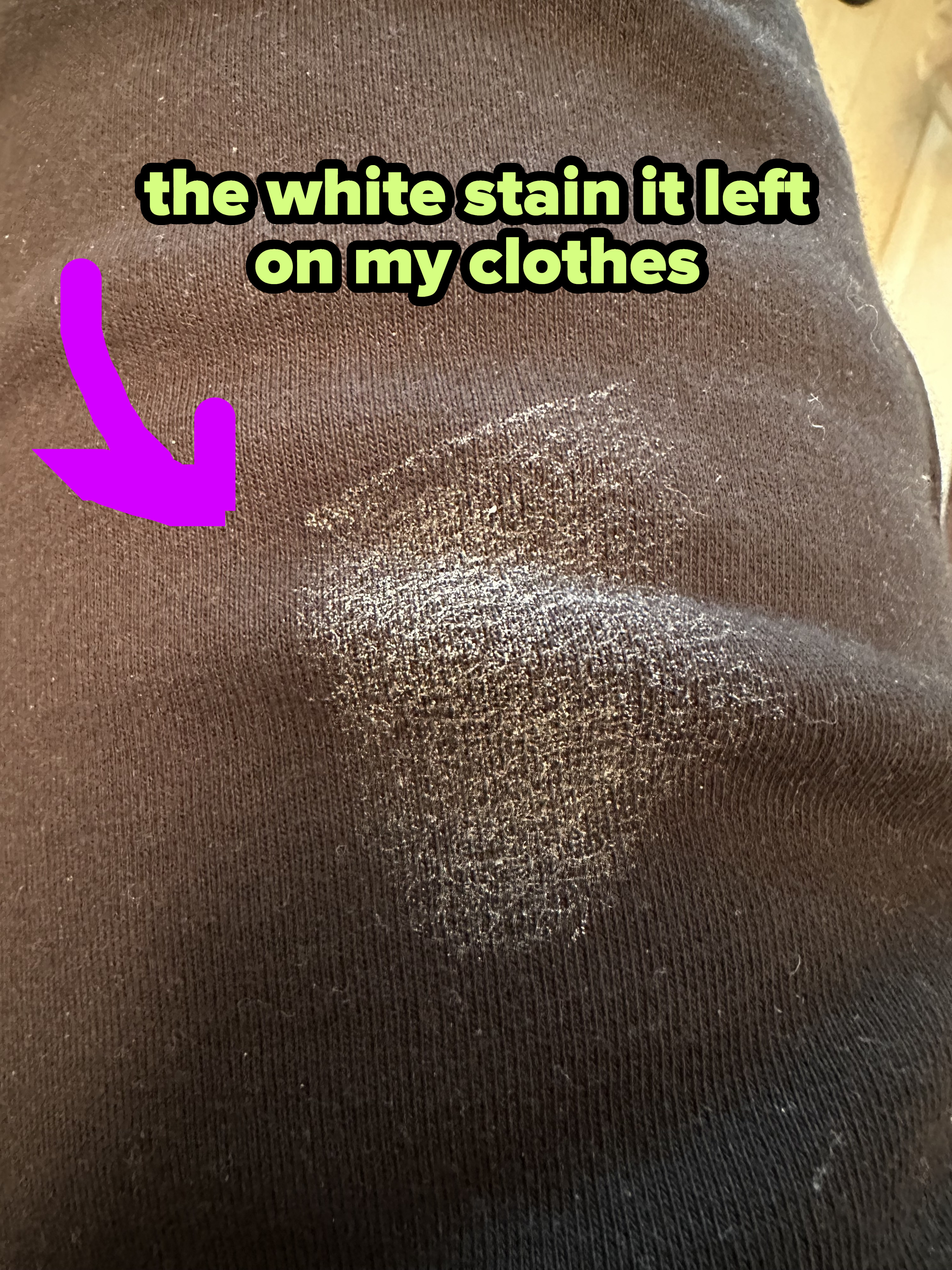 white deodorant stains on a black shirt