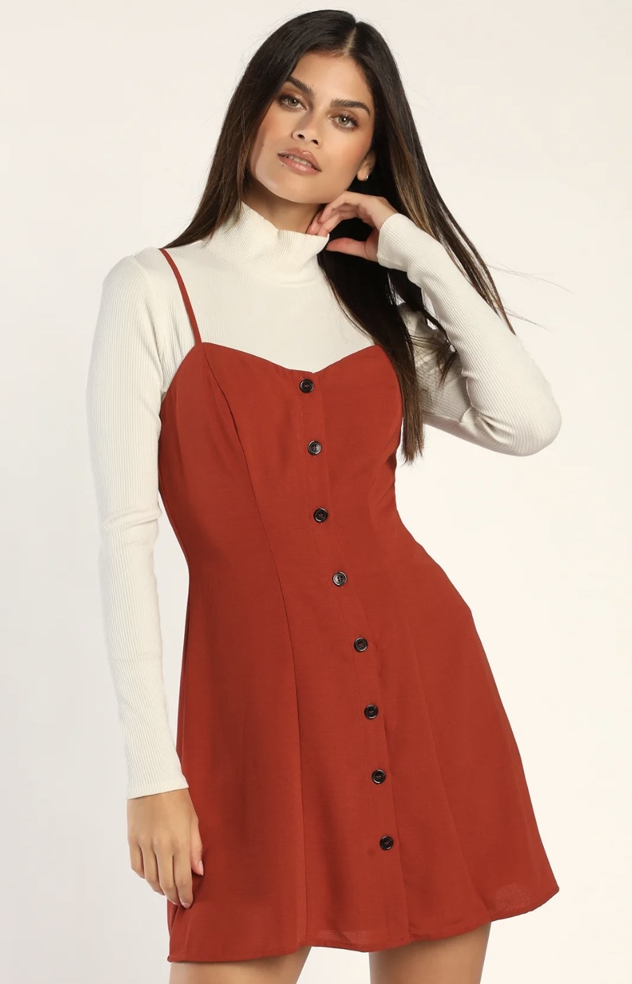 A rust red button up mini dress