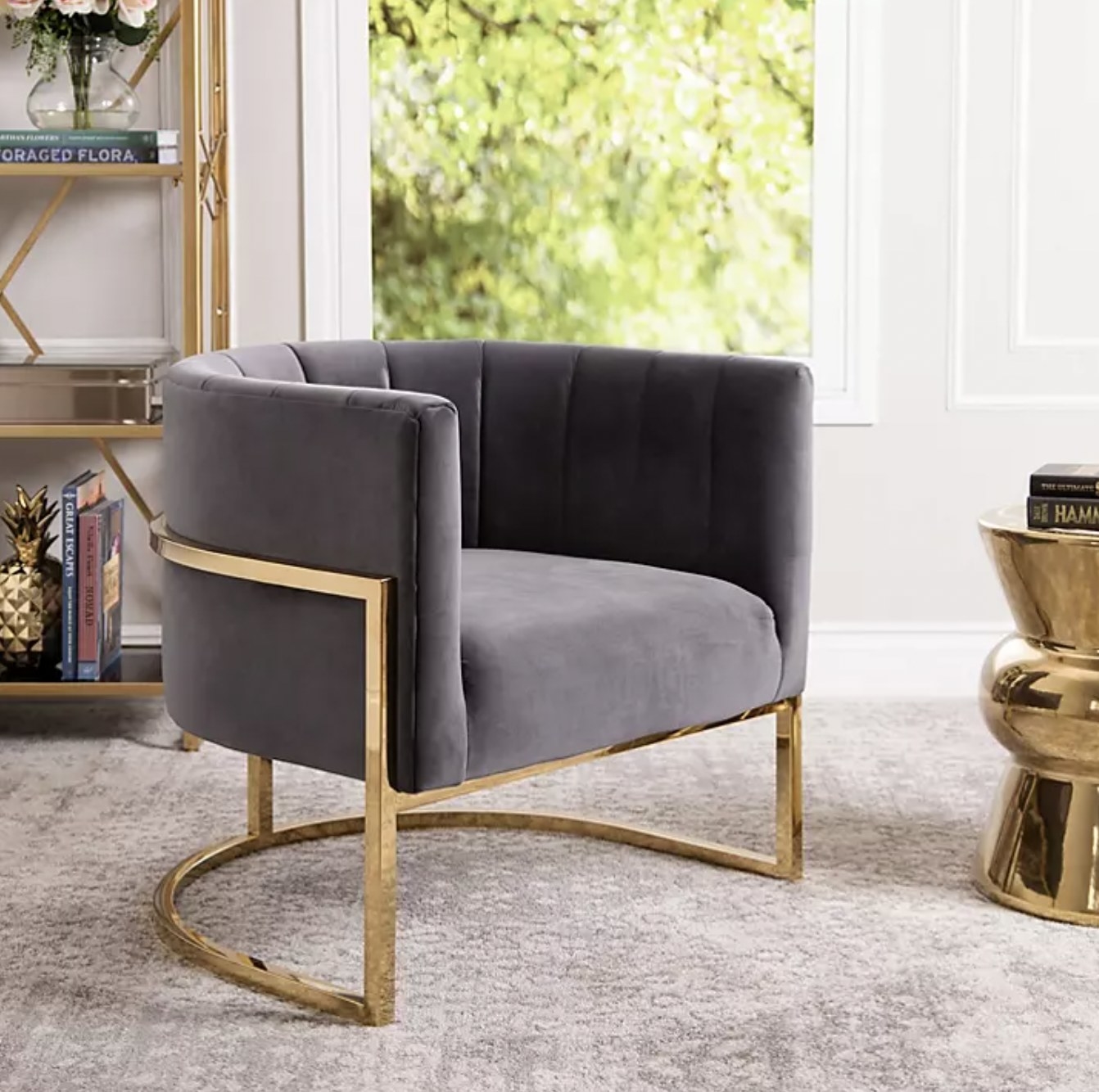 The velvet half-circular chair with gold base