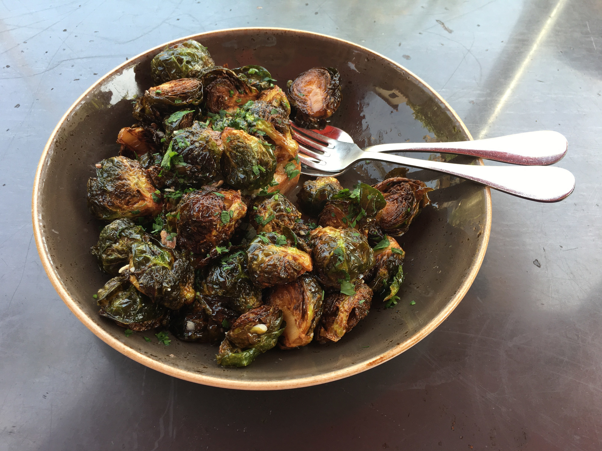 A bowl of cooked Brussels sprouts