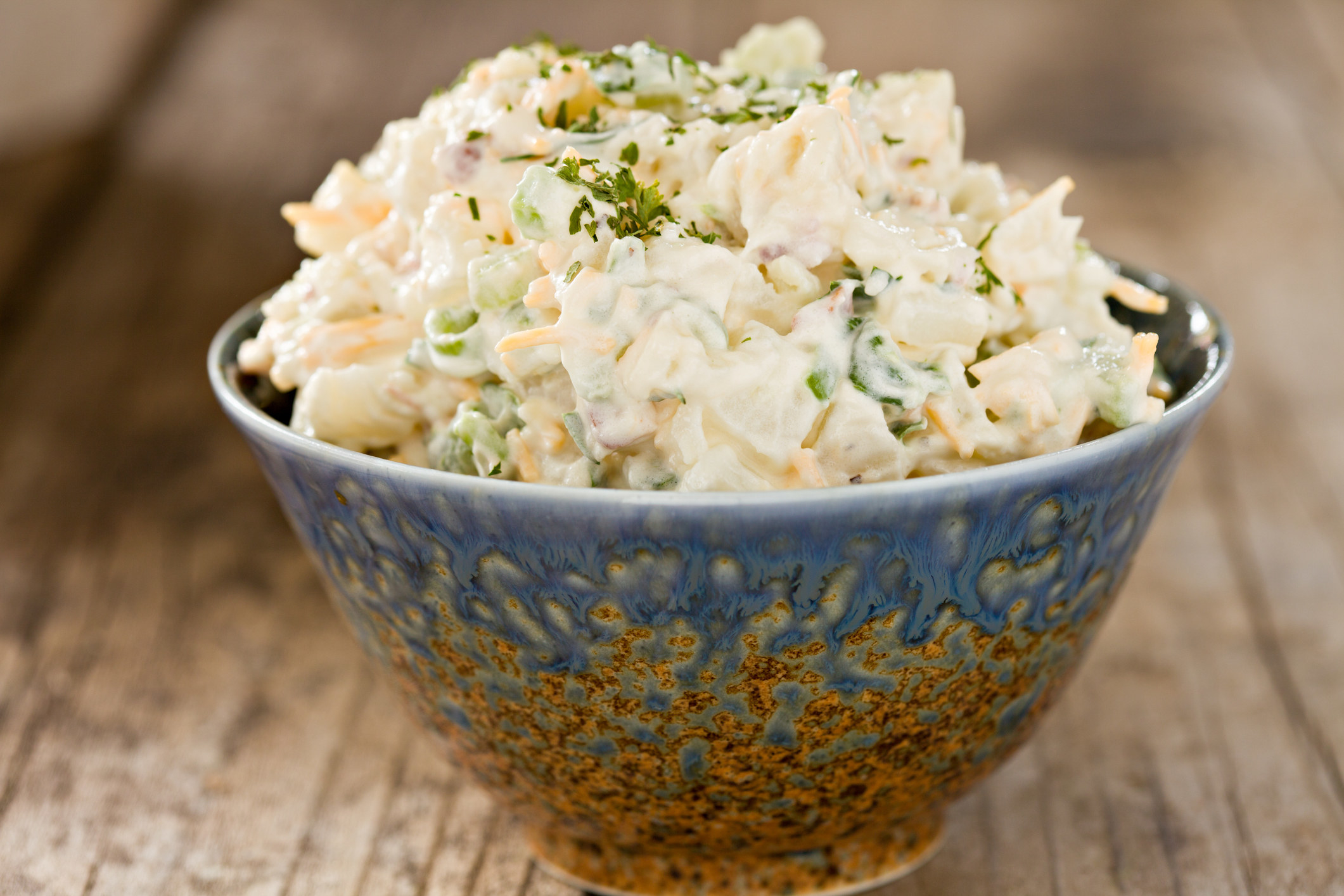 Potato salad in a blue bowl