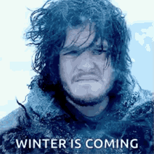 Gif of John Snow getting blown by wind and snow &quot;winter is coming&quot;