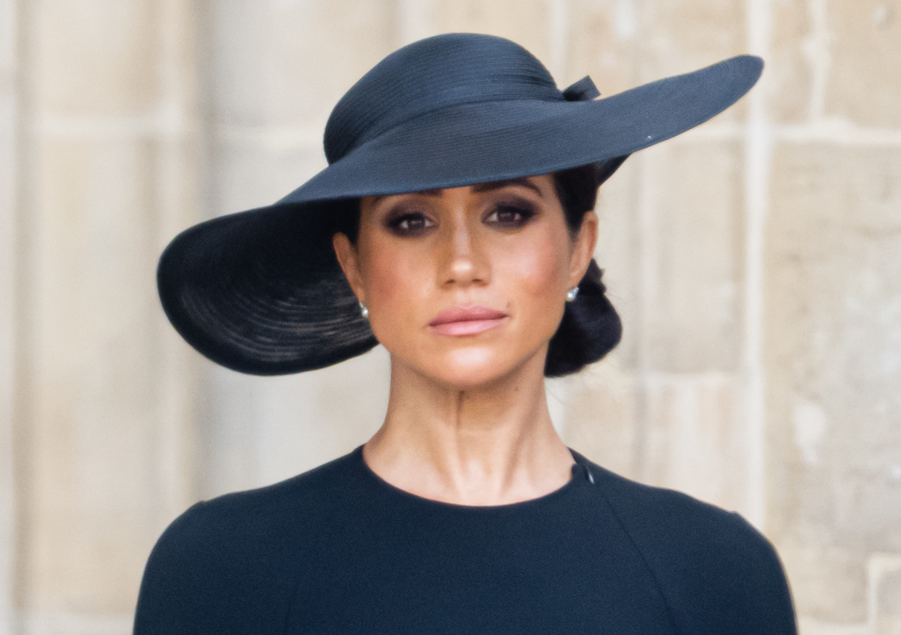 Close-up of Meghan in a wide-brimmed hat