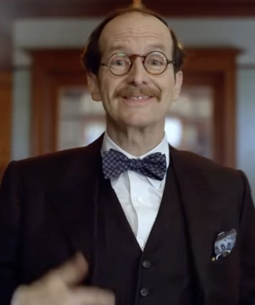 Denis O&#x27;Hare in American Horror Stories wearing a bow tie