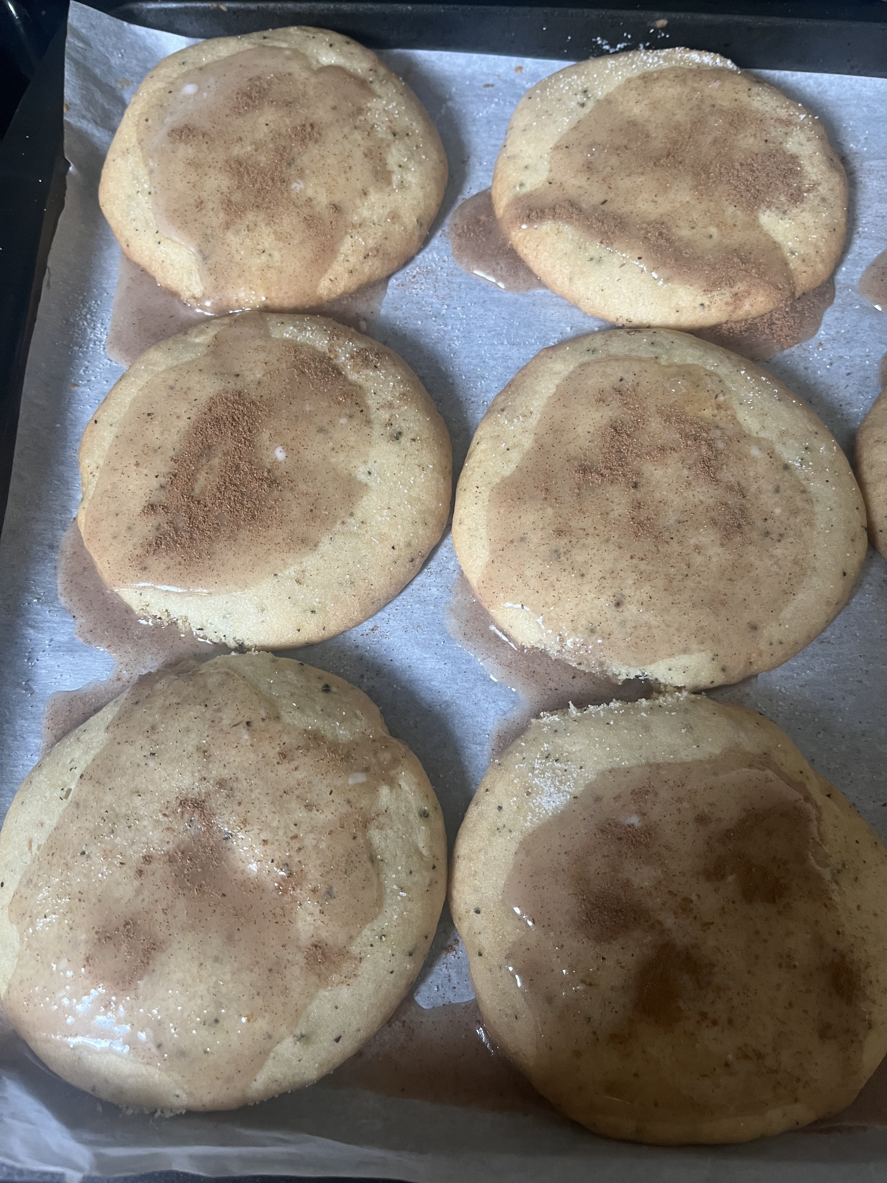 cookies covered in icing and cinnamon