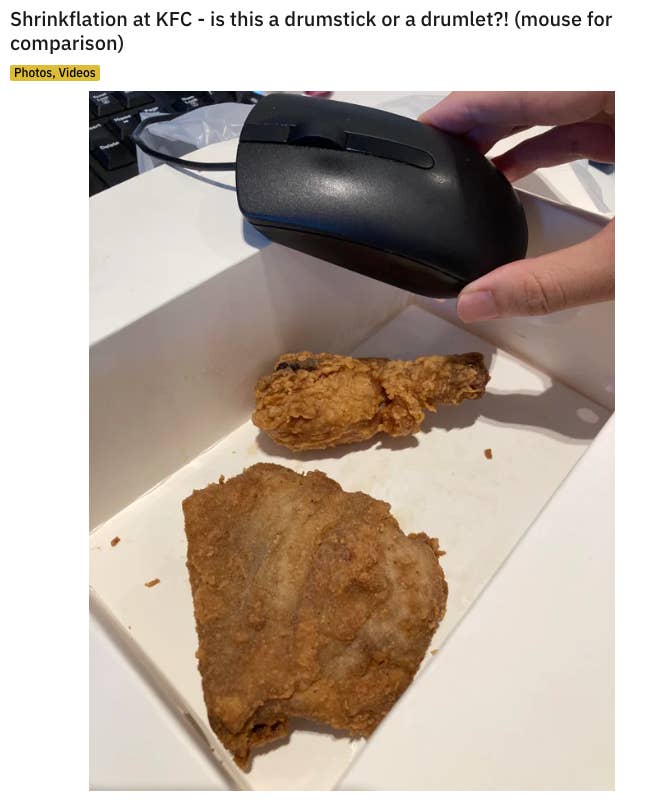 A photo showing the tiny size of a KFC drumstick in comparison to a computer mouse