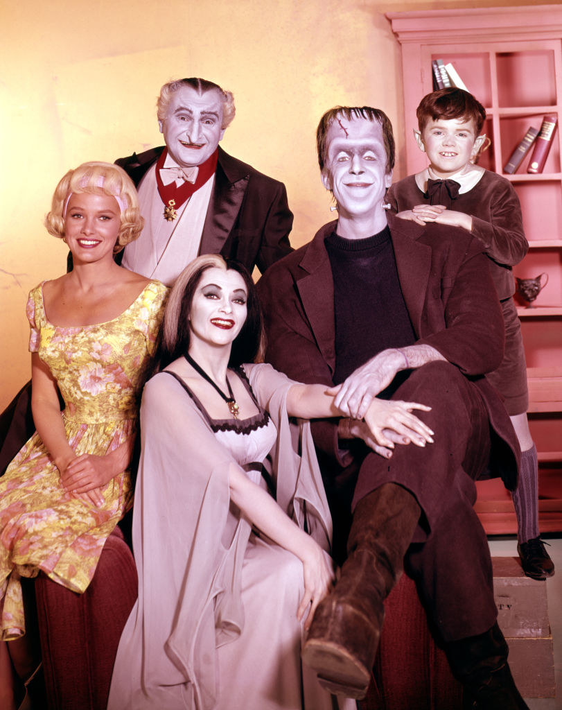 the cast of The Munsters posing for a photo