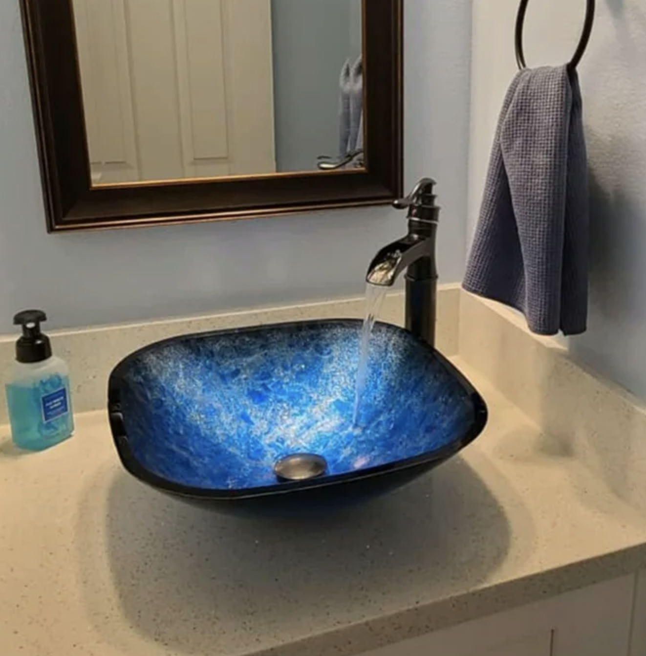 the blue sink in a reviewer&#x27;s bathroom