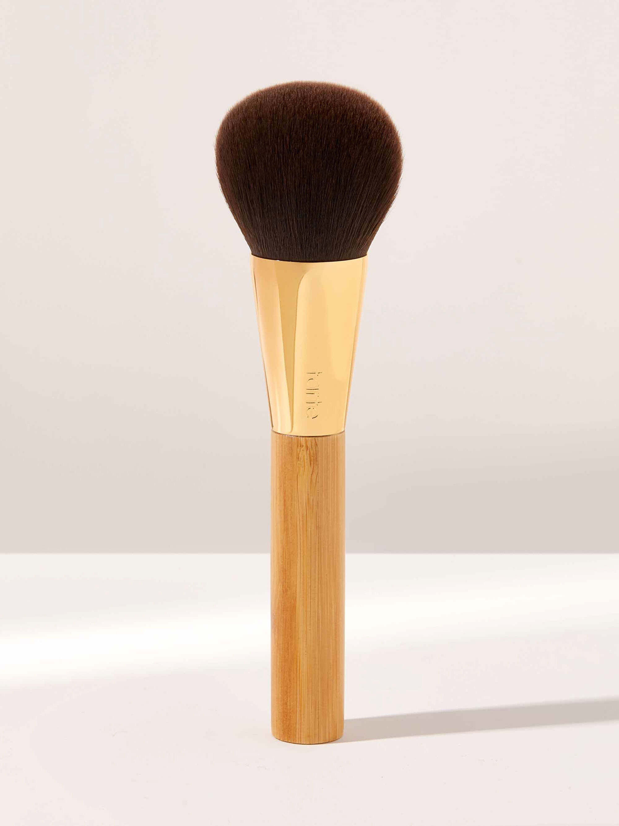 A brown powder brush