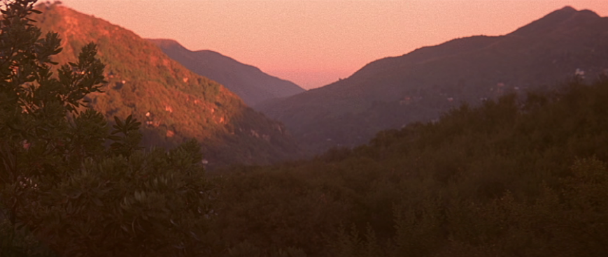 shot of sunset through the california mountains in the movie