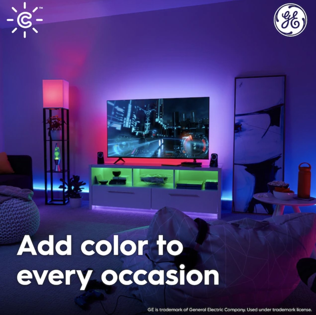 The lightbulbs in a lamp and under tv glowing red and green with caption &quot;add color to every occasion&quot;