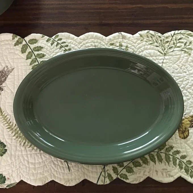 a reviewer photo of the sage green platter