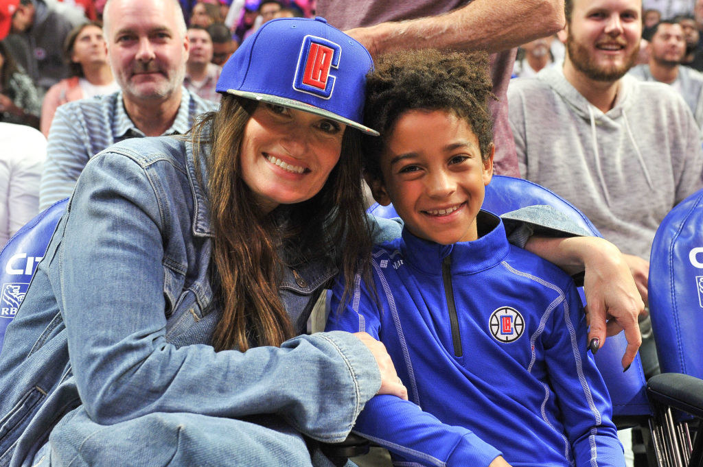Menzel with her son at a game