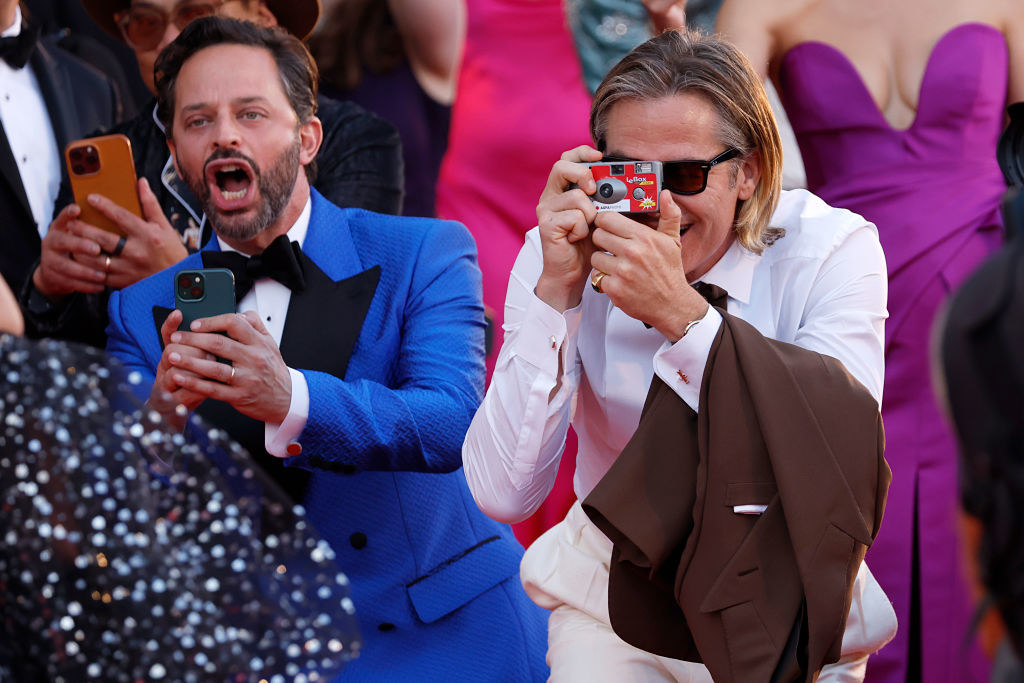 Nick and Chris Pine taking photos on the red carpet