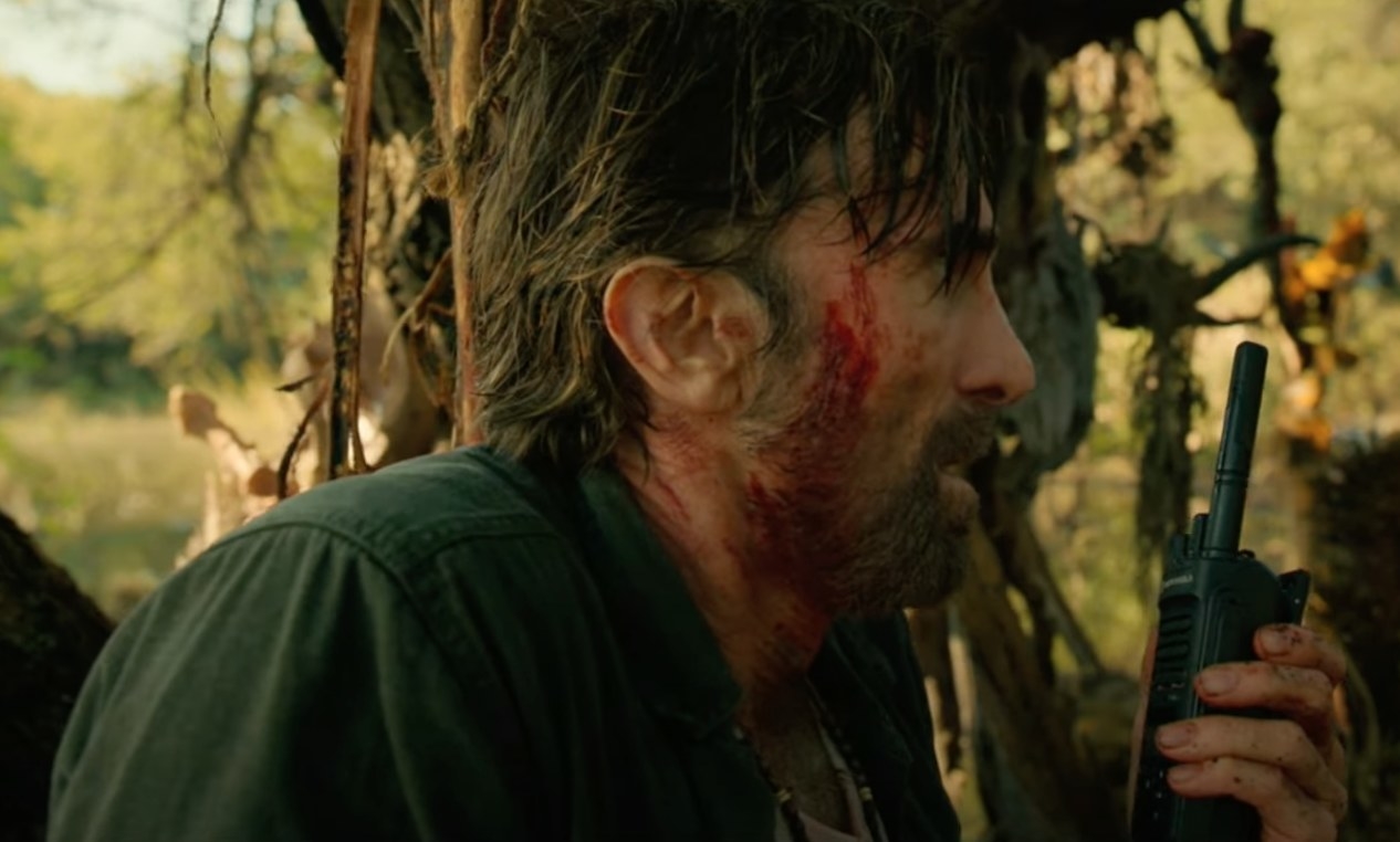 Sharlto Copley injured and covered in blood in Beast