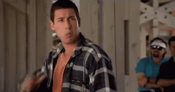 Adam Sandler giving a thumbs-down