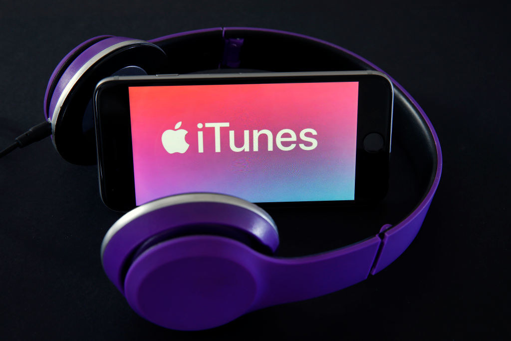 The iTunes logo with a pair of headphones