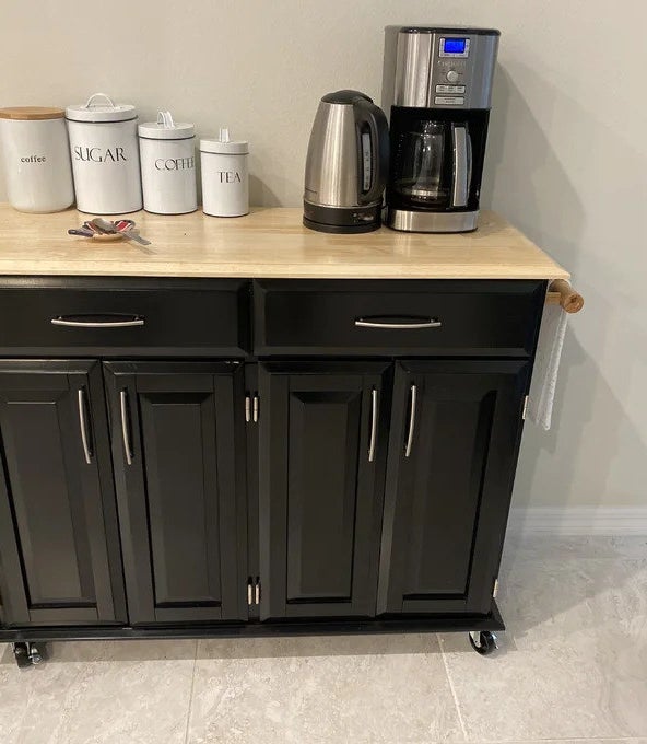 The black rolling kitchen cart