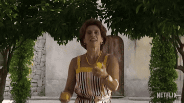 A woman from Hand of God juggles fruit