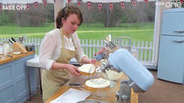 Flora screams while making a cake on Bake Off