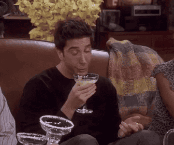 Ross sips on a cocktail in Friends
