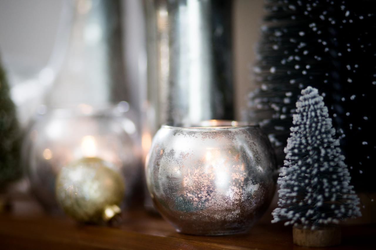 silver mercury glass vases with candles and mini tree and ornament decorations