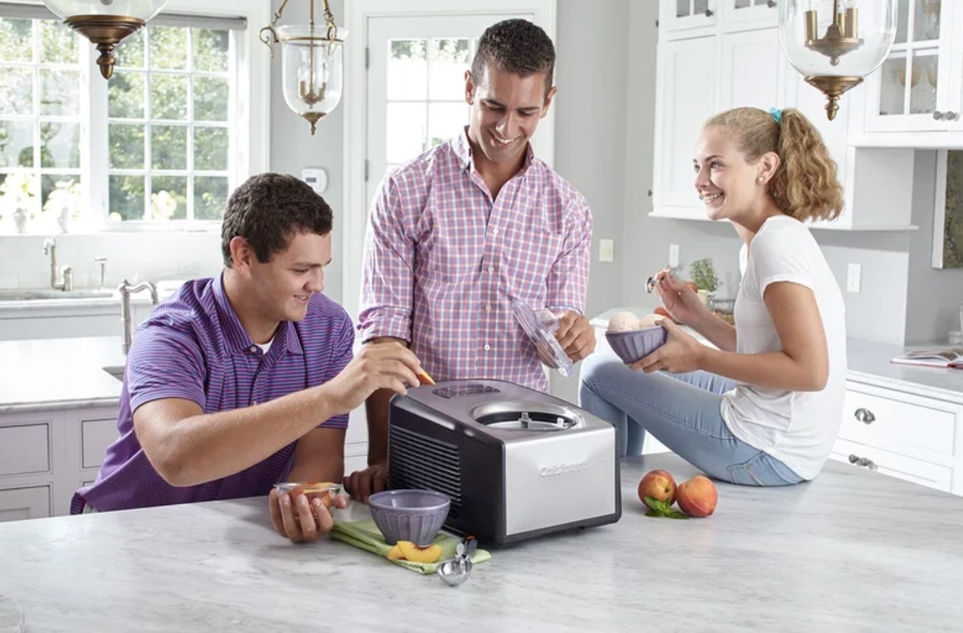 a family using the ice cream and gelato maker and enjoying the ice cream