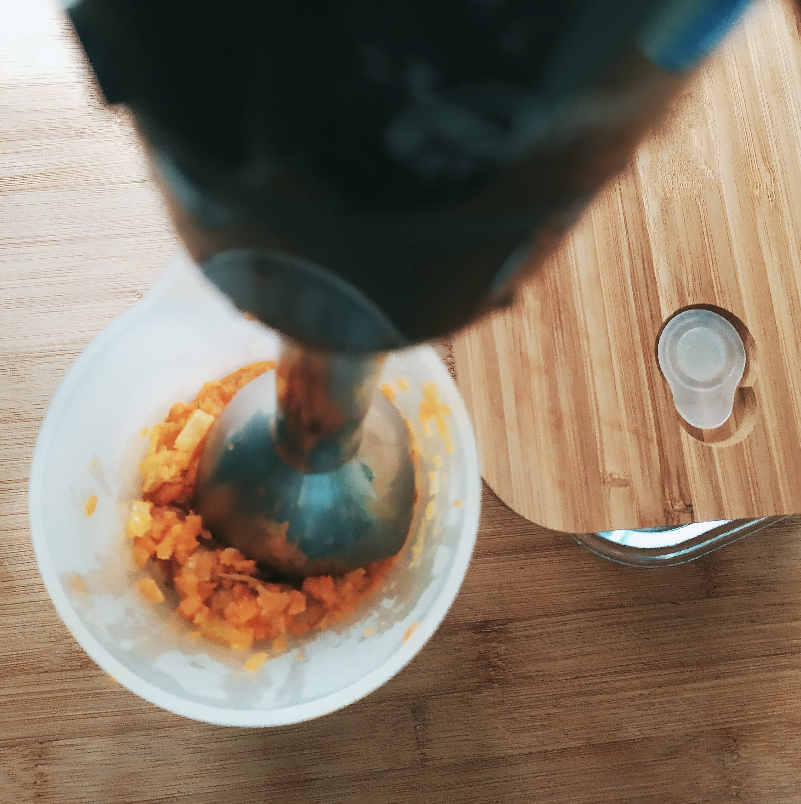 using an immersion blender to blend up food