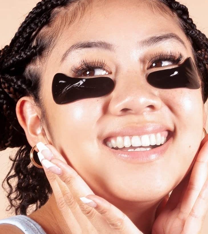 a person wearing the activated charcoal eye masks