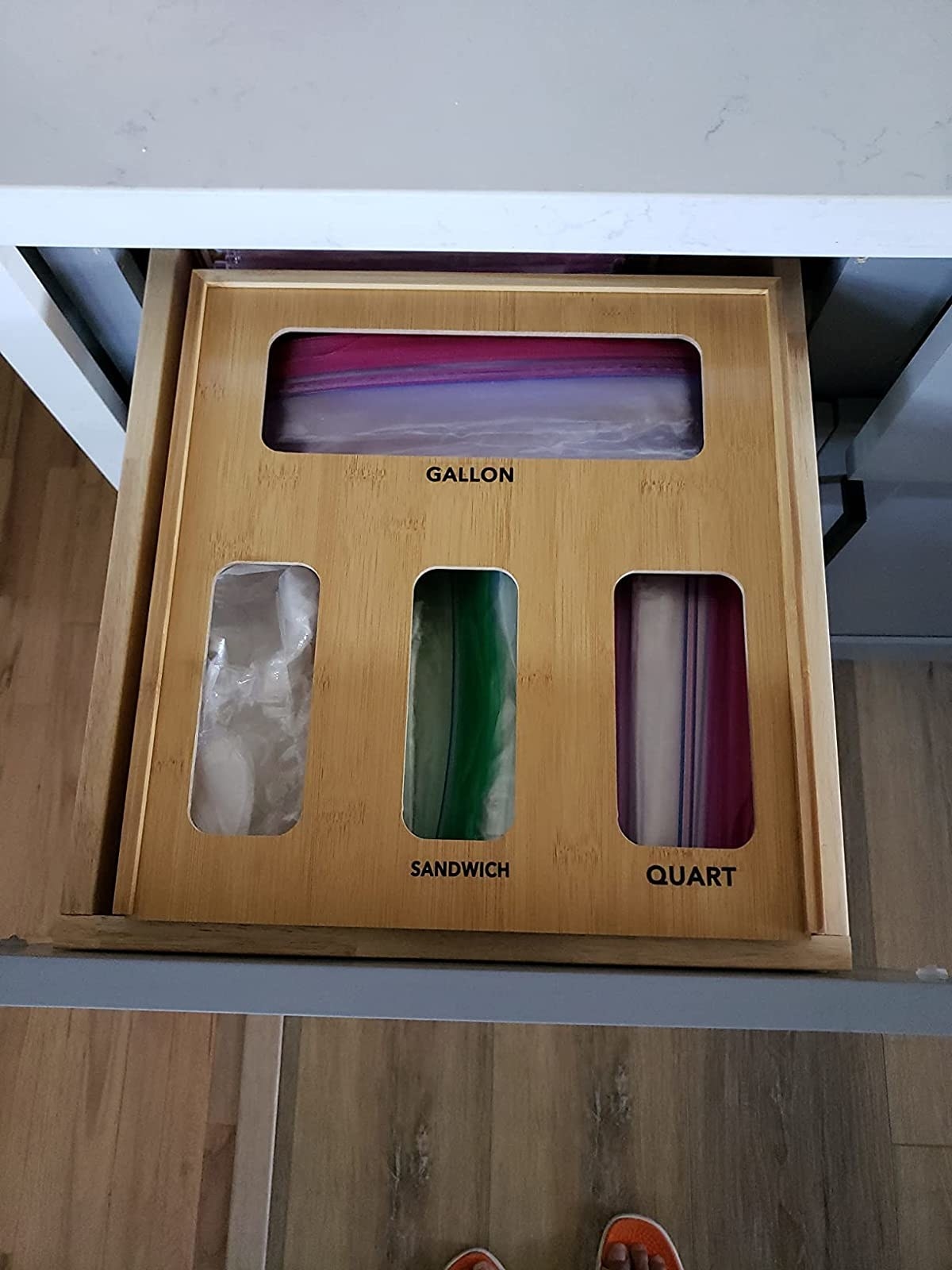 Reviewer image of drawer organizer filled with ziplock bags