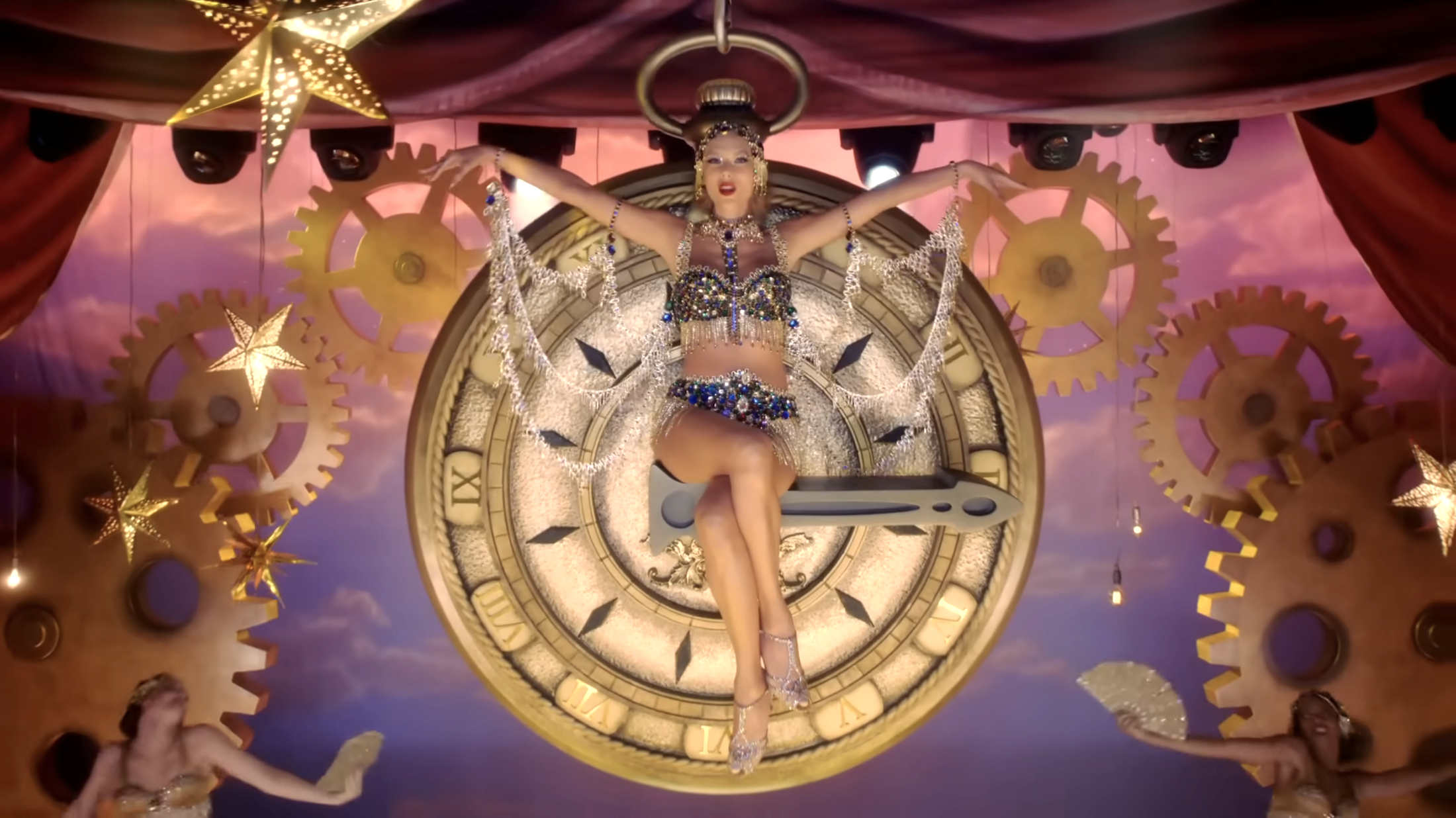 taylor swift suspended in air sitting on clock