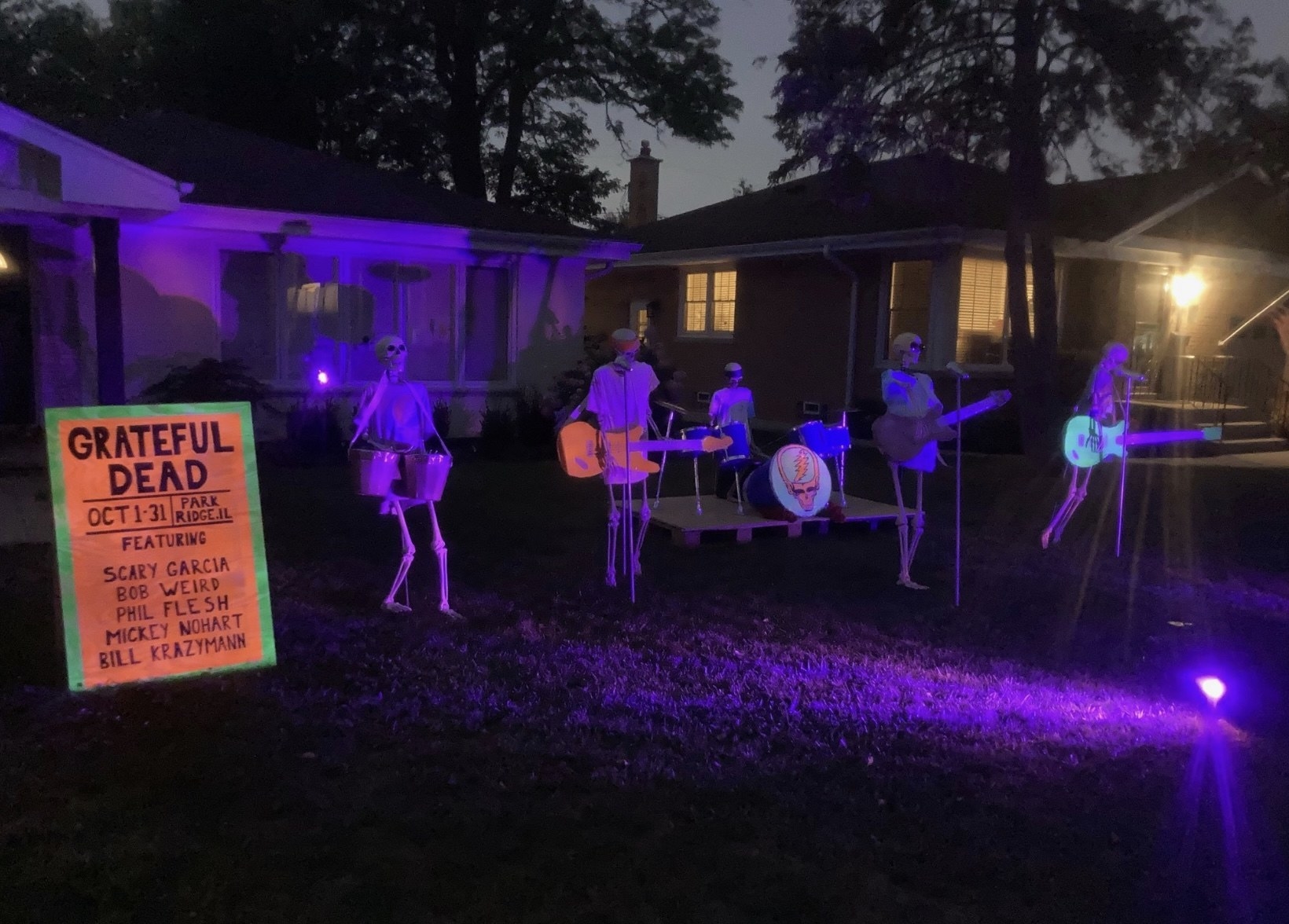 skeletons in a band in the front yard