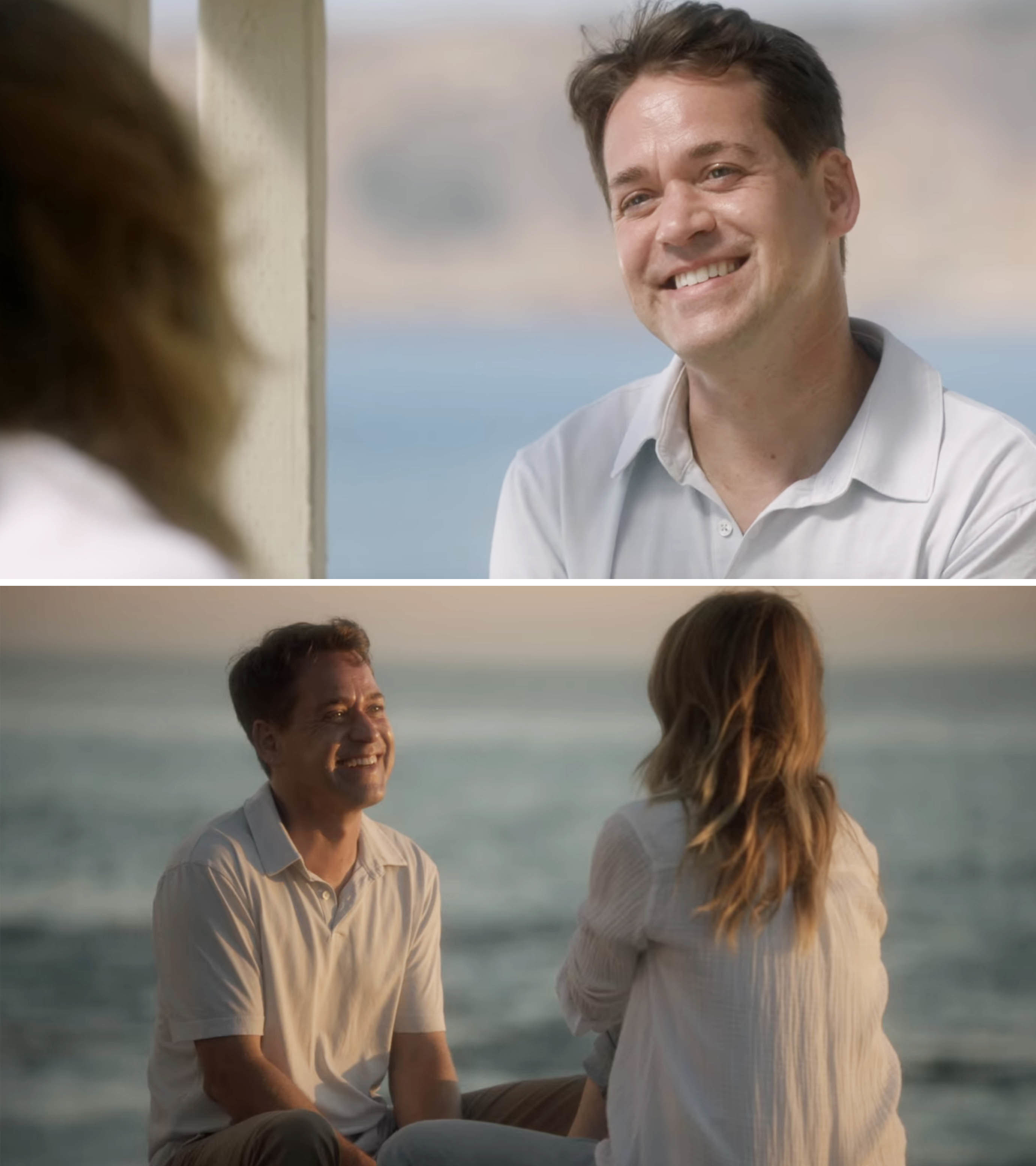 George smiling and sitting with Meredith on the beach