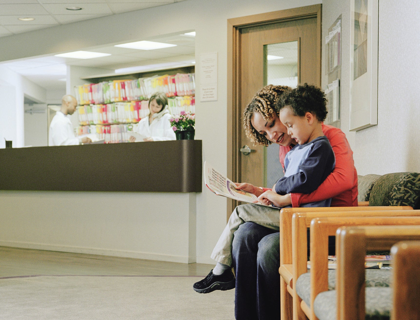 A boy and his mom at the doctor&#x27;s office