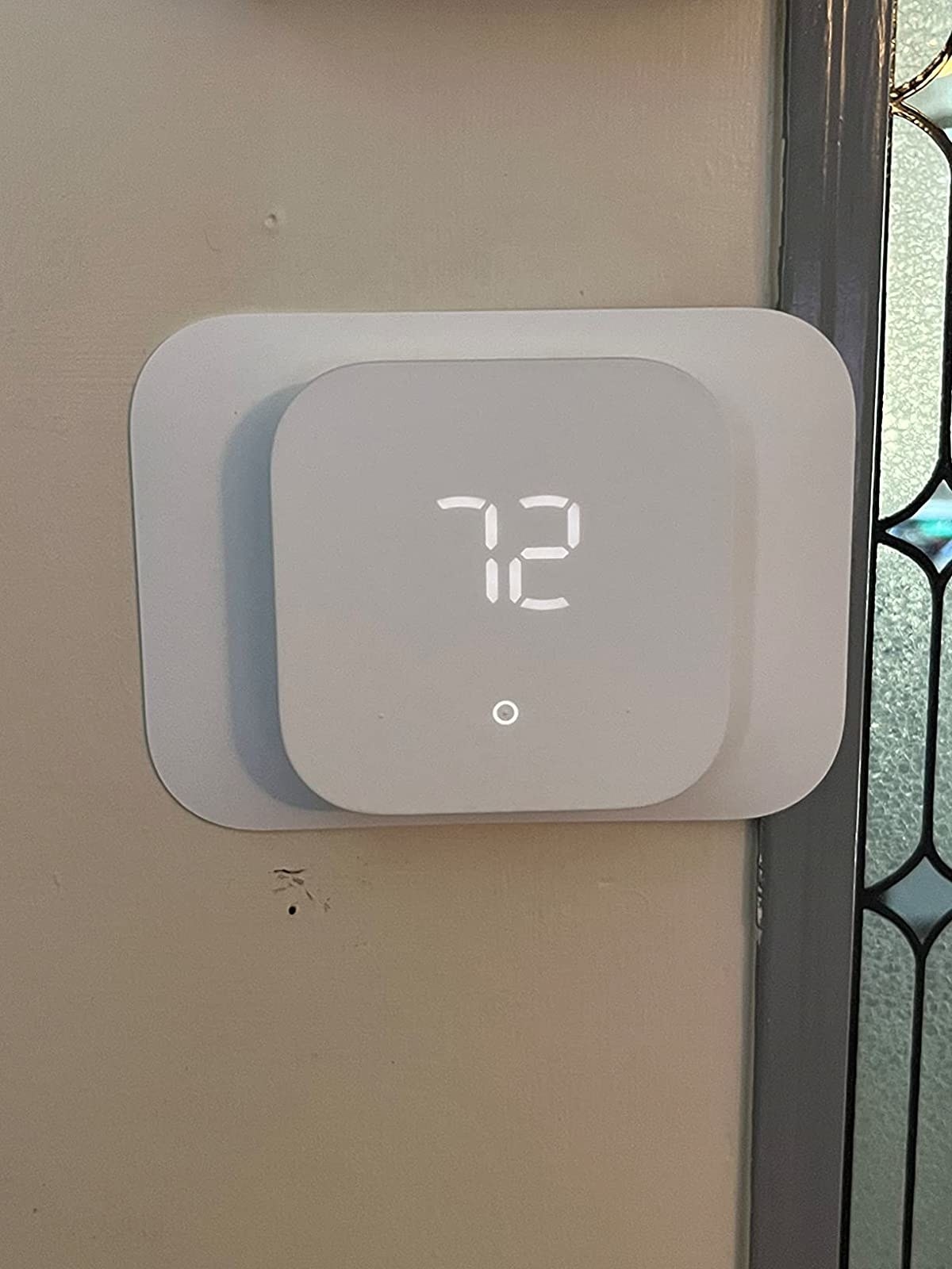 Reviewer image of thermostat on the wall